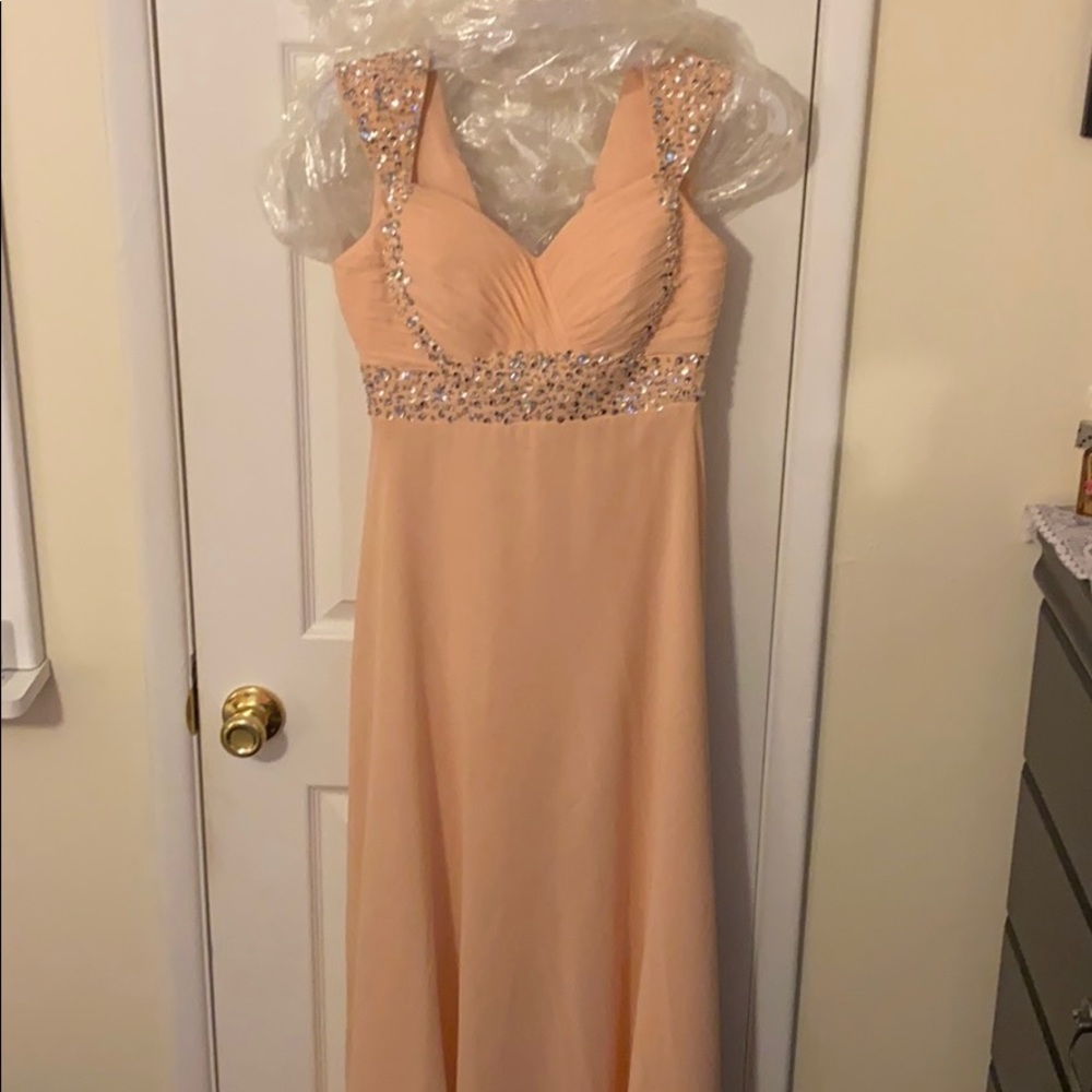 Peach beaded prom dress